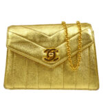 CHANEL 1991-1994 Chevron Letter Flap Vertical Bag Mini Gold Lambskin