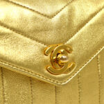 CHANEL 1991-1994 Chevron Letter Flap Vertical Bag Mini Gold Lambskin