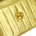CHANEL 1991-1994 Chevron Letter Flap Vertical Bag Mini Gold Lambskin